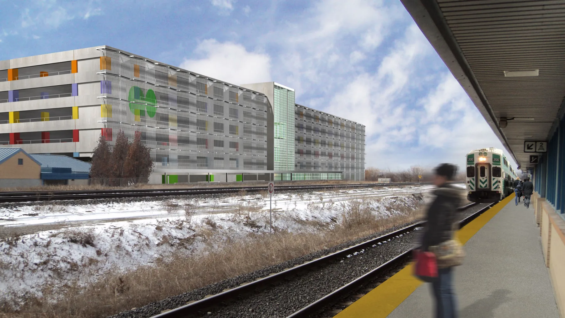 Exterior rendering of the railway platforms, showing the parking structure in the back