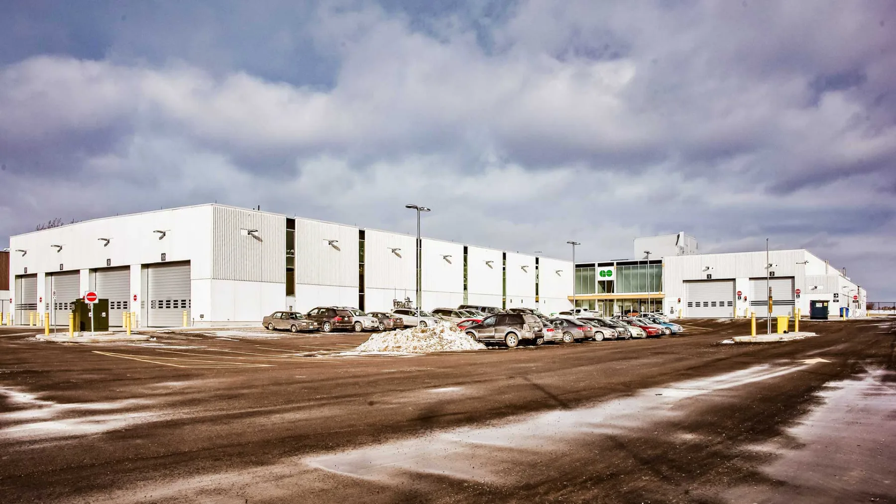 Exterior photo showing the facility in entirety, parking lot in the front