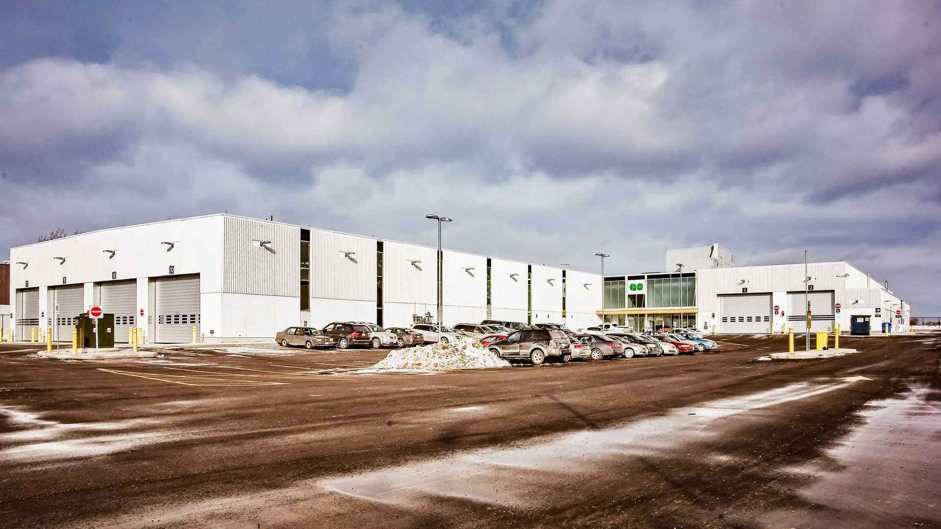 Exterior photo showing the facility in entirety, parking lot in the front