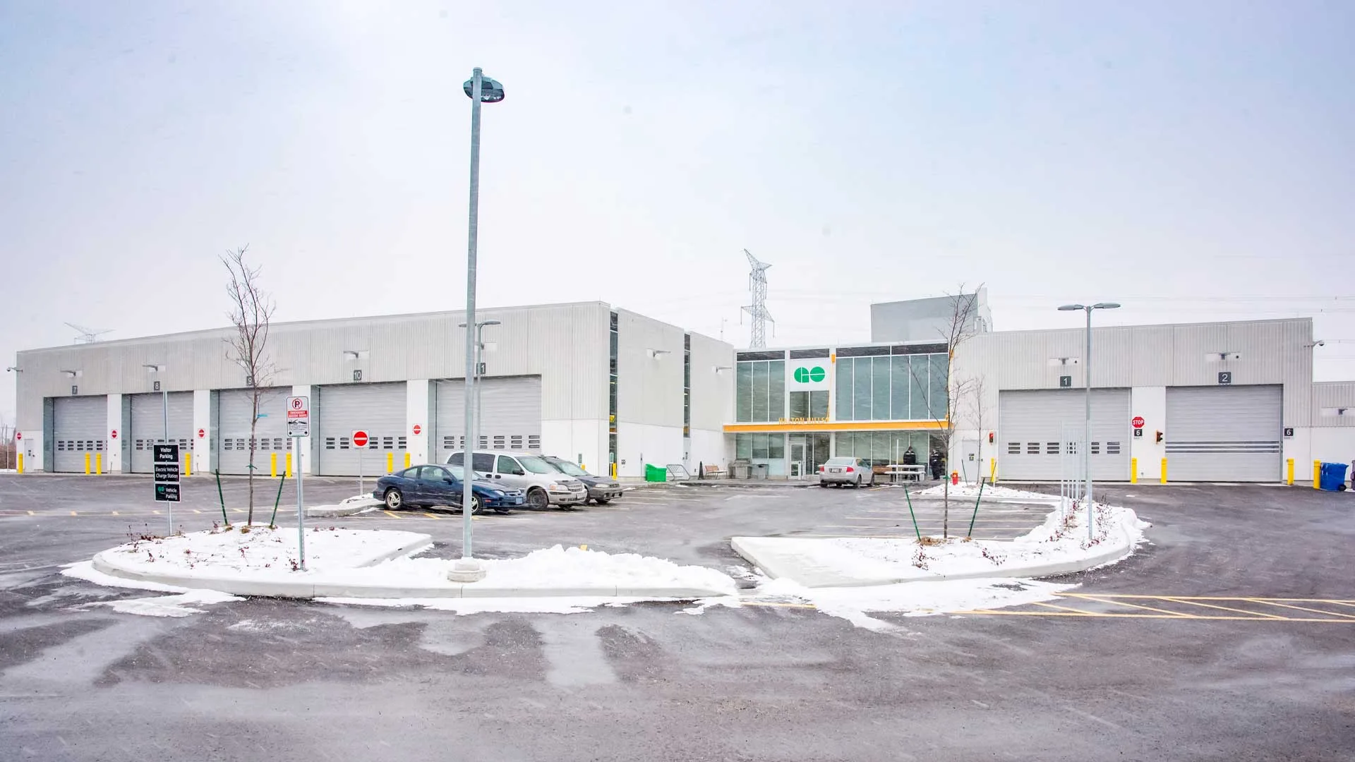 Exterior photo of the facility showing the entire building and the parking lot in the front