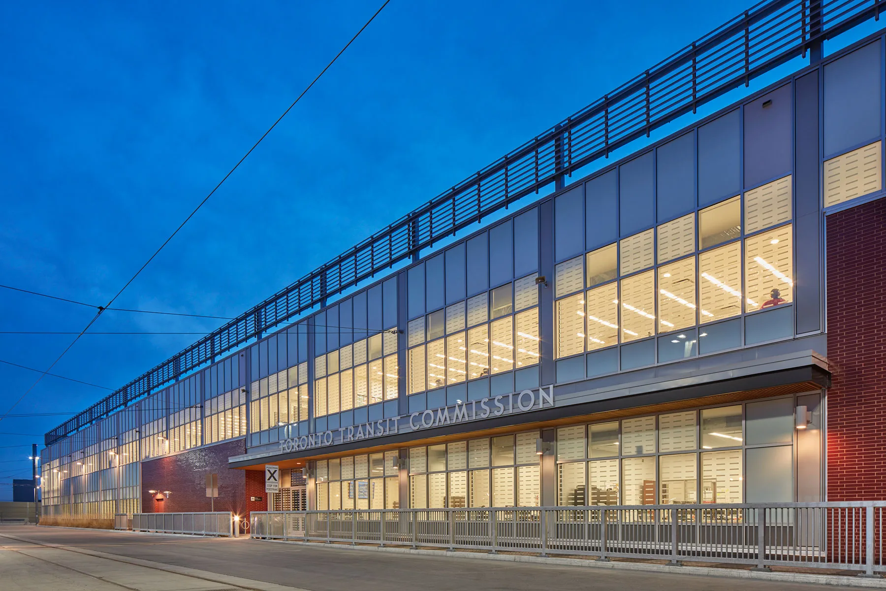 Exterior photo of the building façade, the signage reads as "Toronto Transit Commission" above the entrance.