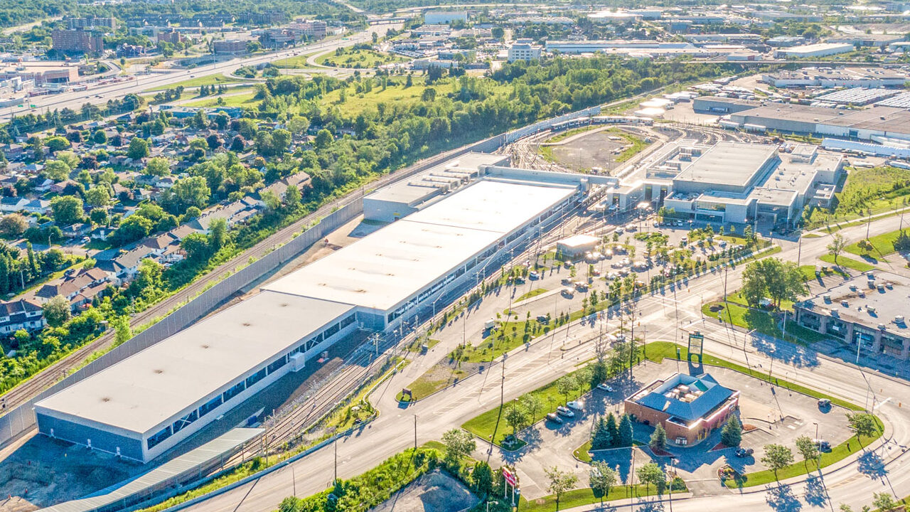 Aerial view of the facility showing the building, train yard and the neighborhood